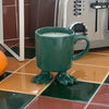 Ceramic Dinosaur Footed Mug © | Green Footed Mugs Dylan Kendall 